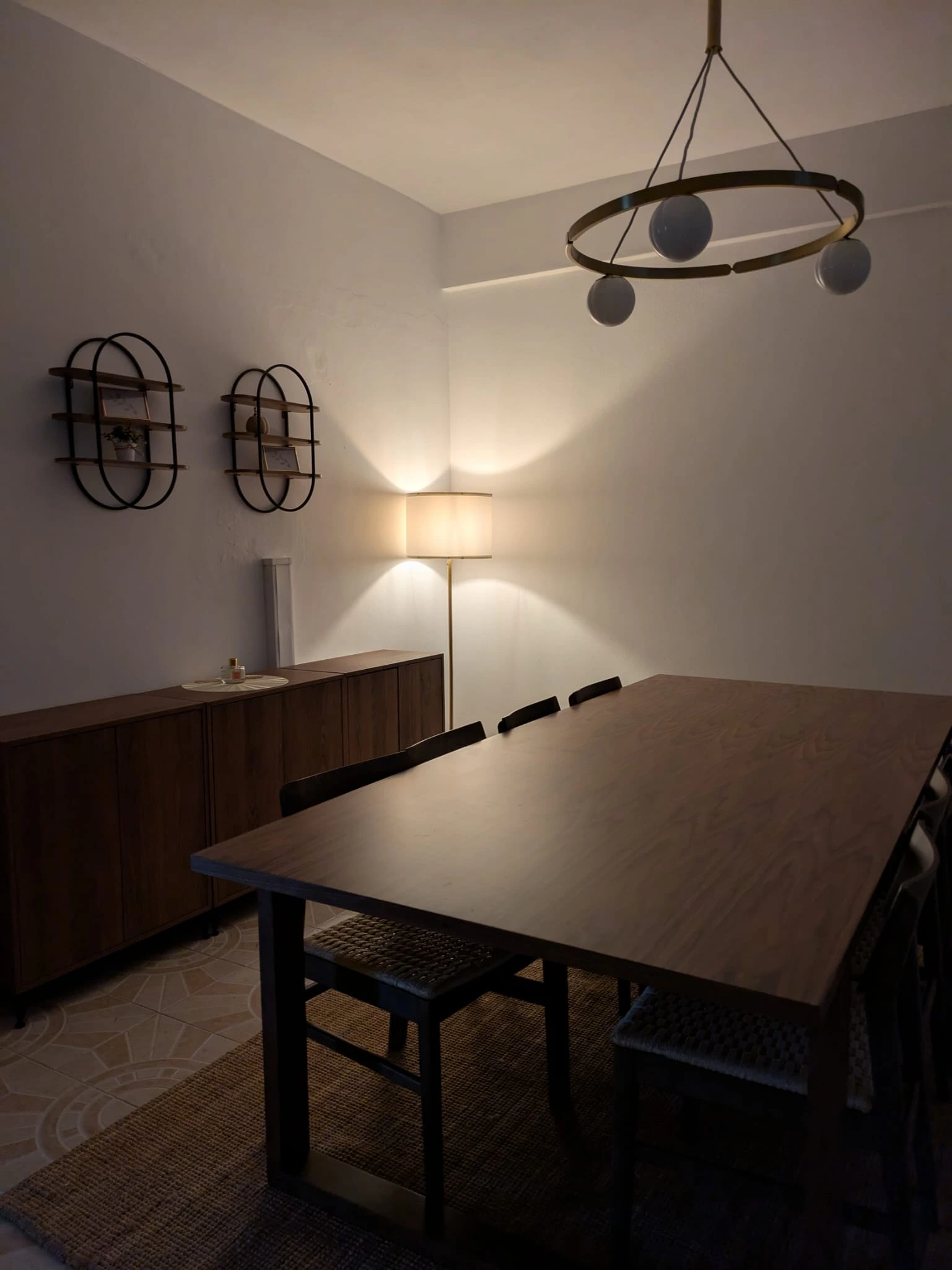 Side table next to the sideboard, prepared for group gatherings.